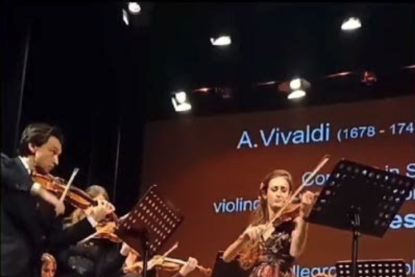 One of our wonderful violin tutors, EMMA ARIZA, played the solo violin part in Vivaldi's Four Seasons recently.  Check out the clips in this You Tube video!