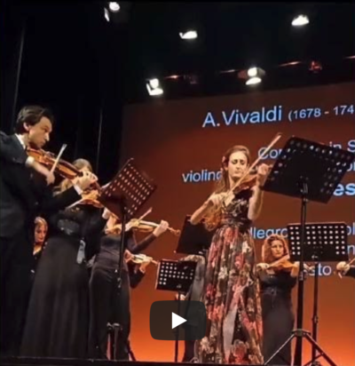 One of our wonderful violin tutors, EMMA ARIZA, played the solo violin part in Vivaldi's Four Seasons recently.  Check out the clips in this You Tube video!